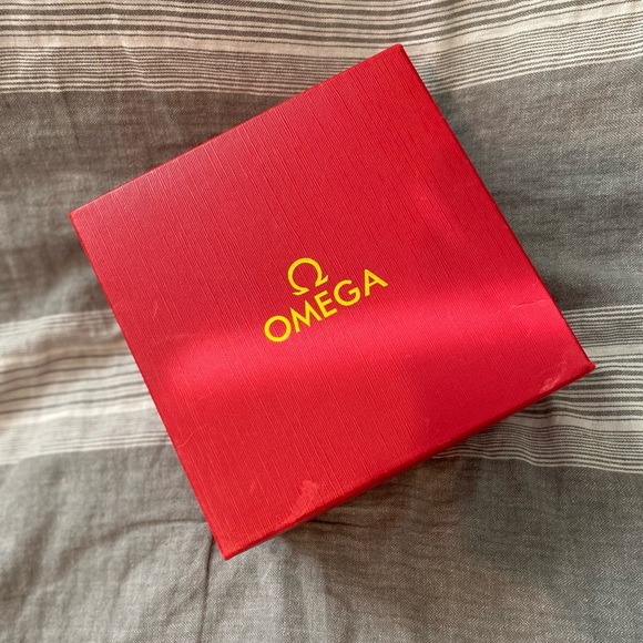 Brand new black Omega co-axial constellation watches with its red case